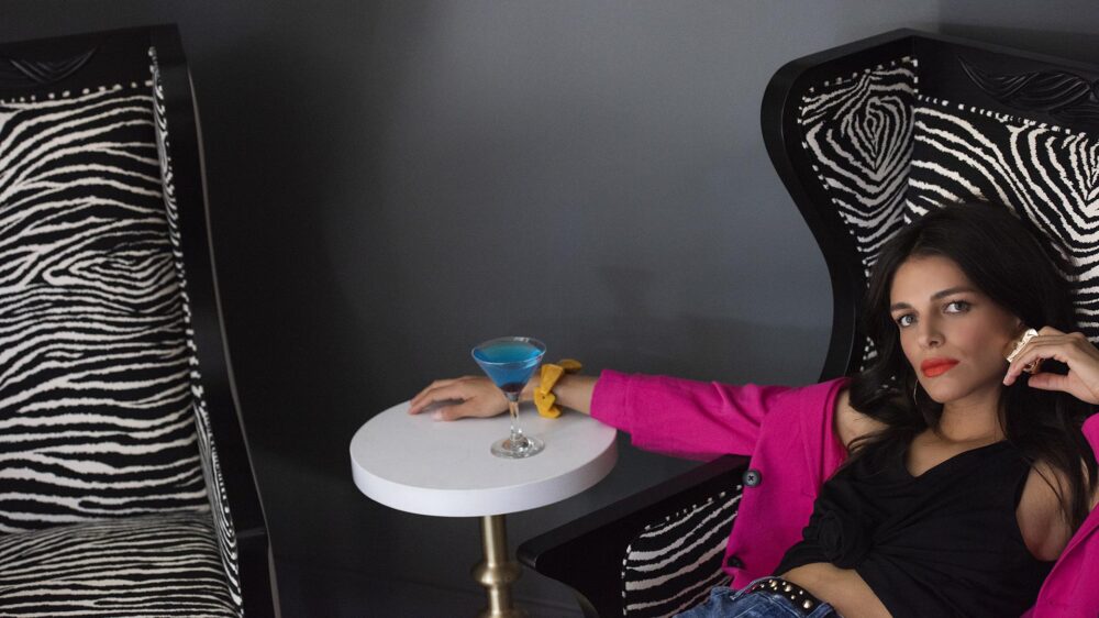 Woman lounging with martini