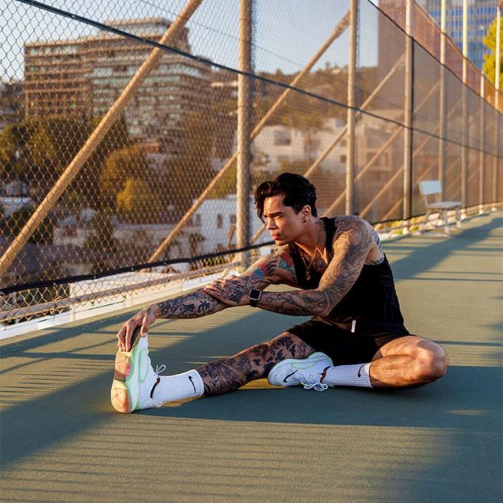 Man stretching outside